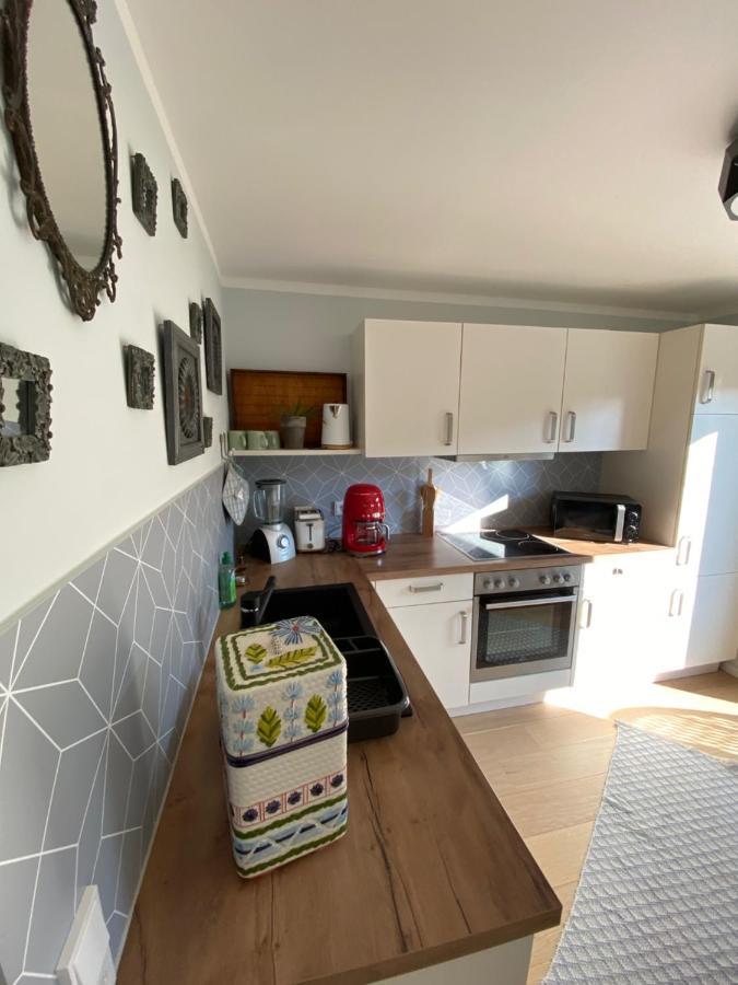 Schoene Wohnung Mit Ausblick Und Gartensitzplatz เลอร์ราค ภายนอก รูปภาพ